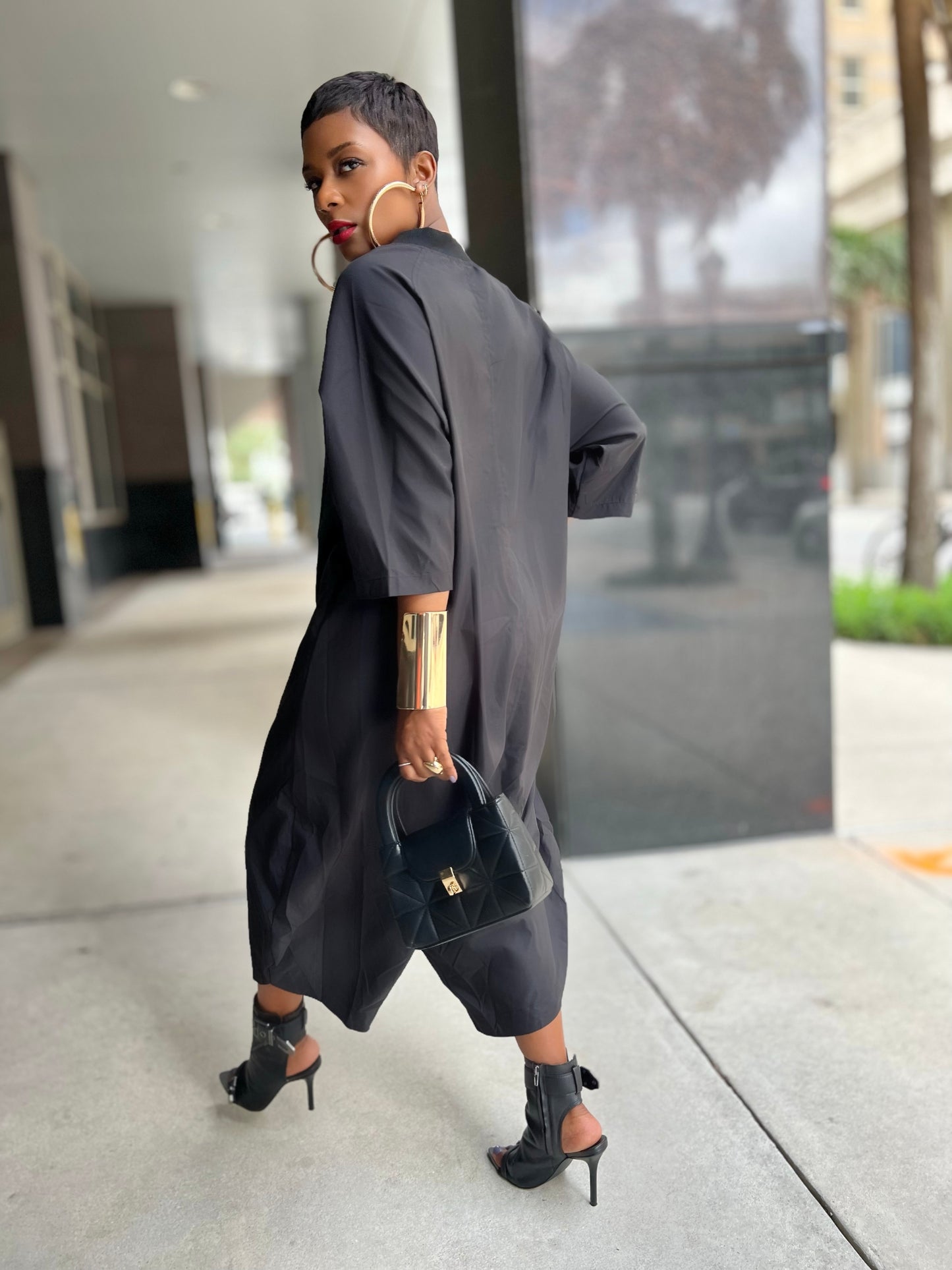 Black Ola Jumpsuit (One size up to 14)